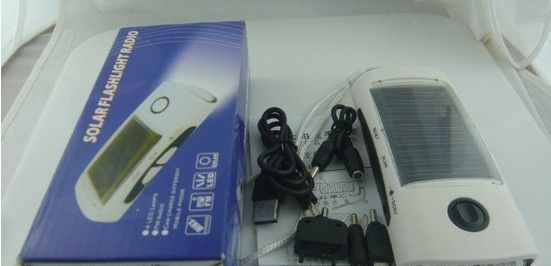 多功能太阳能手电筒 <font color=red>LED</font>灯带FM 手机/MP3充电器