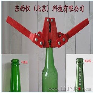 压盖器